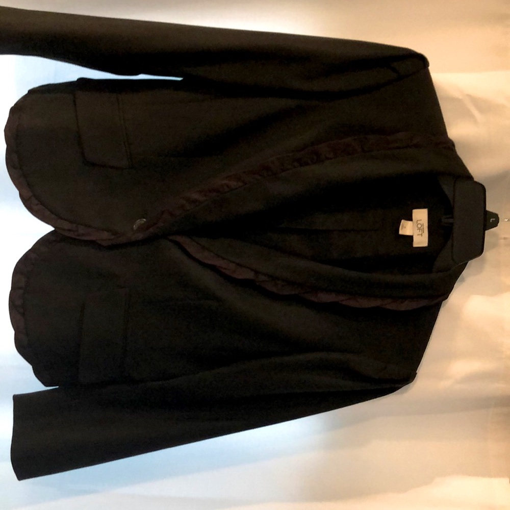 Ruffle detailed black size 8 Loft black blazer. Slimming and barely worn!
